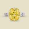 20 Natural Color Yellow Sapphire 585ct with Tapered Baguette Diamonds 060ct in 18K White and Yellow Gold