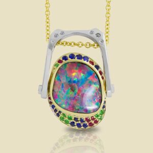 Boulder Opal 1026ct with Ruby Sapphire and Tsavorite Accents in 18kt Yellow and White Gold Pendant