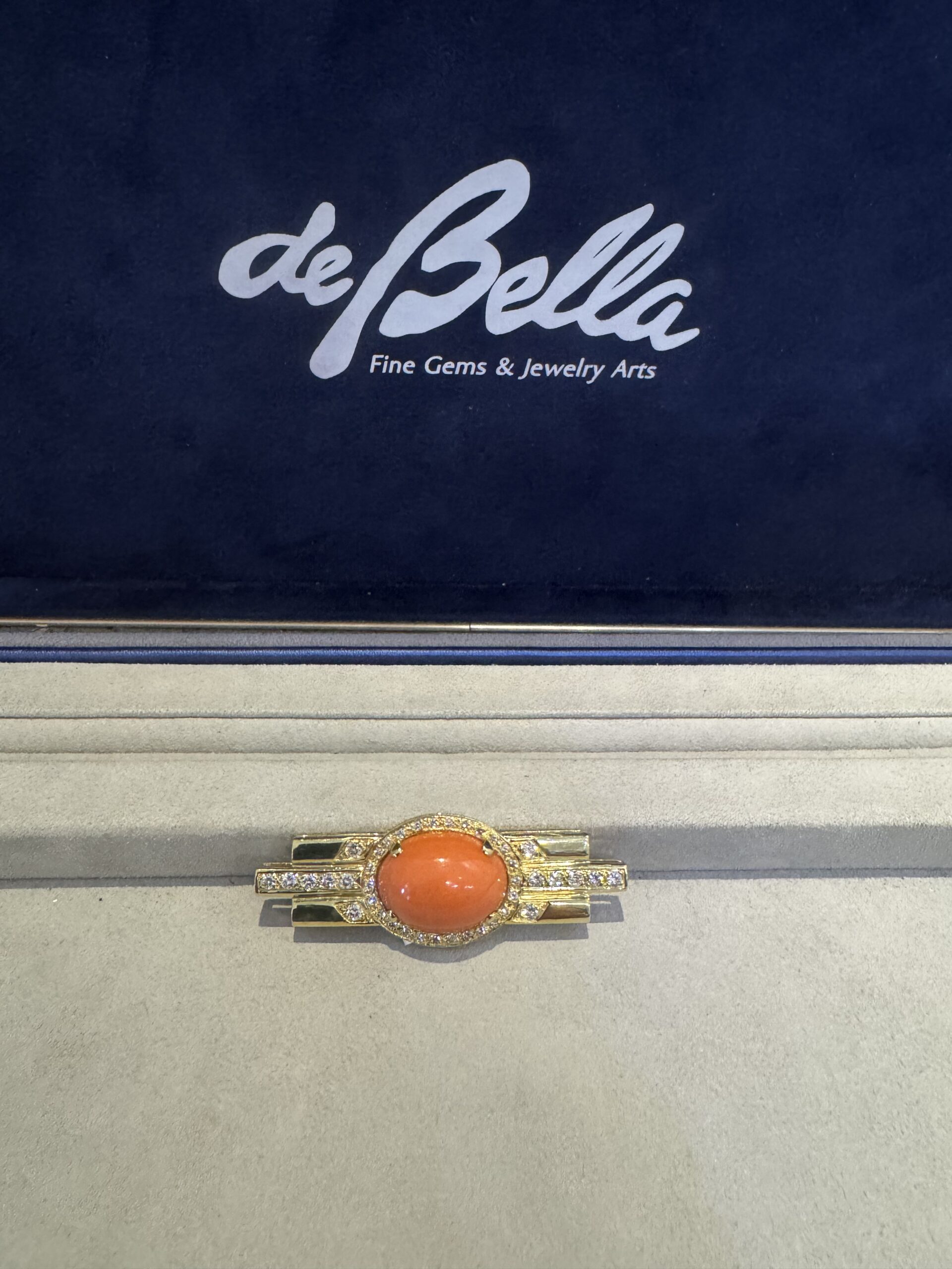 18k Gold Coral & Diamond Zia symbol brooch